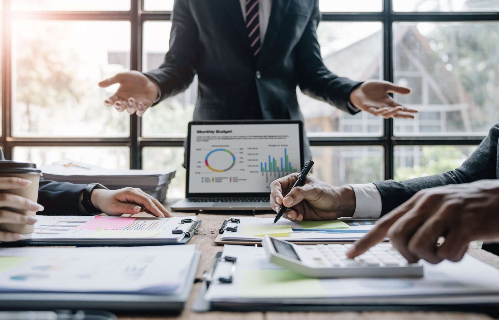 Advisers reviewing business figures together