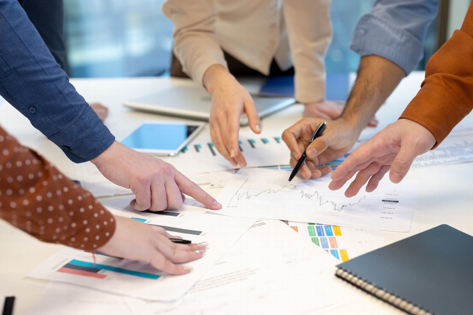 A team bringing clarity to business charts and reports